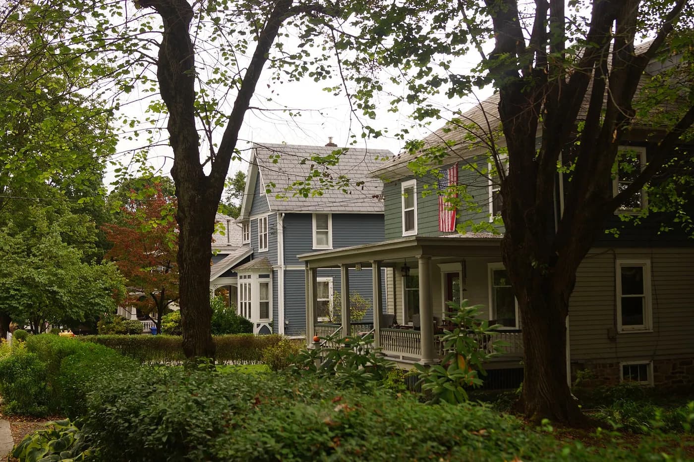 Historic houses with steep pitched roofs in the Califon Historic District, New Jersey